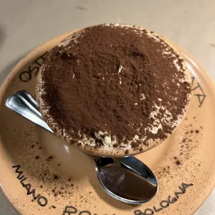 a chocolate dessert with a spoon