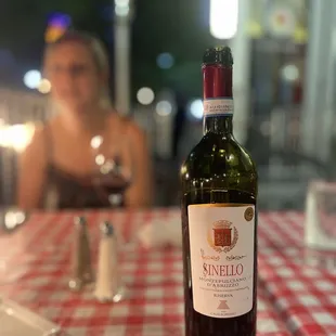 a bottle of wine on a table