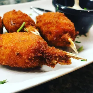 a plate of deep fried chicken nuggies