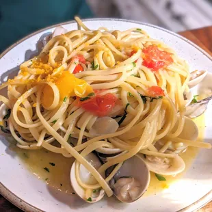 a plate of pasta with clams