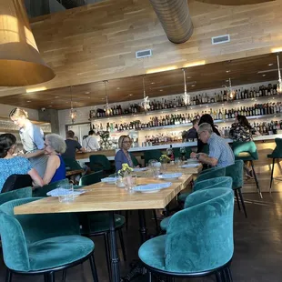 a group of people sitting at a restaurant