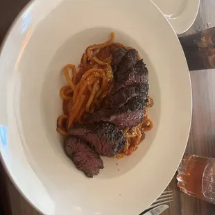 Pasta with a flank steak and red sauce