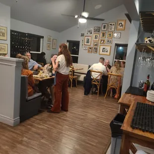 a group of people sitting at a table