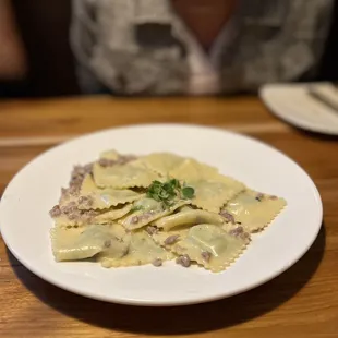 TORTELLI ALLA NORCINA ricotta and spinach tortelli in a creamy sauce with sausage and a hint of truffle