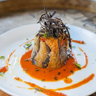 a plate of food on a wooden table