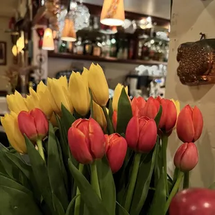 Fresh flowers along the bar