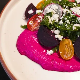 Greca salad with mixed greems, arugula, beets, yogurt, sage vinaigrette, pine nuts