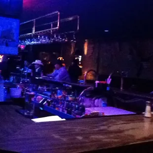 people sitting at a bar