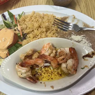 Garlic shrimp with rice, beans, salad and a side of tortillas