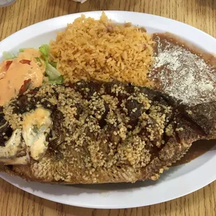 Mojarra combo plate.  The mojarra is nicely fried, seasoned and covered in a garlic and butter sauce.  A must try!  4-18-18.