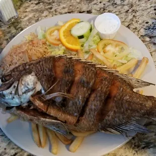 a whole fish on a plate