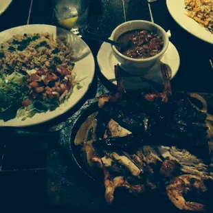 Meat, chicken, fly grilled shrimp with rice and delicious beans with bacon! Can't go wrong! Yum!