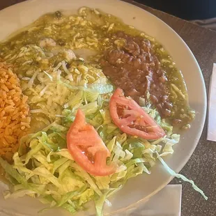 Enchiladas Verdes with shrimp, because the only chicken they have to stuff the enchiladas is &quot;fajita cubes&quot;.