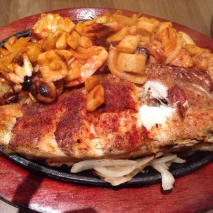 Parrillada de Mariscos - 1 whole catfish w/grilled octopus, squid, scallops, and clams.