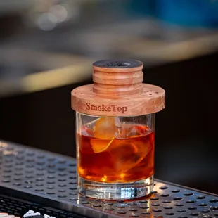 a shot of a drink on a bar