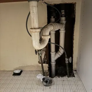 Under sink in kitchen at Osu live building