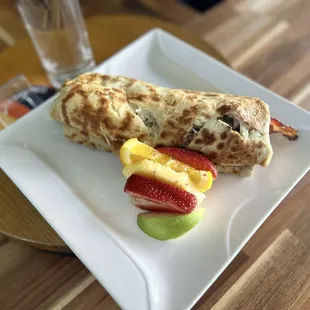 We are serving breakfast crepe with egg,ham,mushroom,cheese and bacon.Enjoy it!