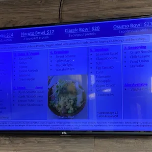 a menu displayed on a flat screen tv