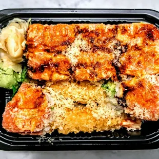 O.M.G Roll: Shrimp Tempura, Avocado, &amp; Mango Rolled Inside, Topped W. Spicy Tuna In Spicy Mayo, Shiracha, &amp; Eel Sauce With Crunch. $16.95