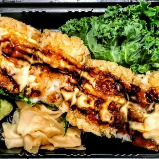 Shrimp Tabasco Roll: Shrimp Avocado Roll Inside Topped With Tempura Shrimp In Chef&apos;s Special Tabasco Mayo &amp; Eel Sauce. $15.95
