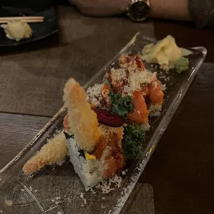 a sushi dish on a clear plate