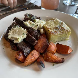 Skirt Steak, potato gratin, roasted carrots, blue cheese butter