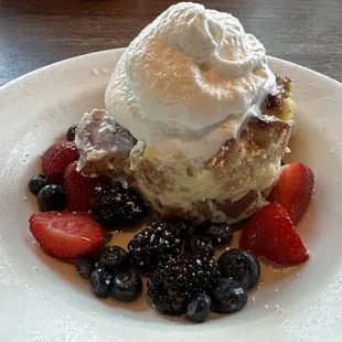 Meyer lemon bread pudding, berry cocktail, whipped cream.
