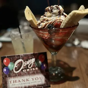 Birthday celebration dessert from the Oswego Grill staff!  Staff signed the card.