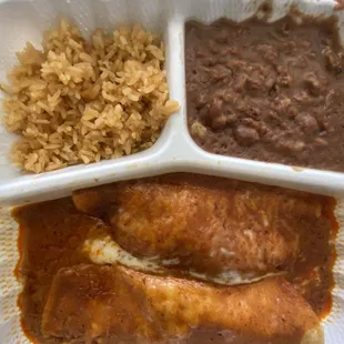 Chicken enchiladas with red sauce, kinda skimped on the cheese on this order. Still satisfied though.