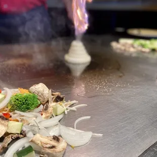a plate of food being prepared