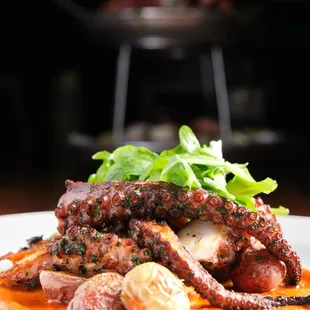 grilled octopus, roasted baby potatoes, chili cashew sauce