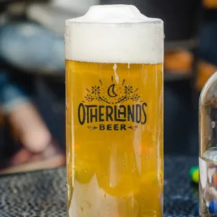 a glass of beer on a table