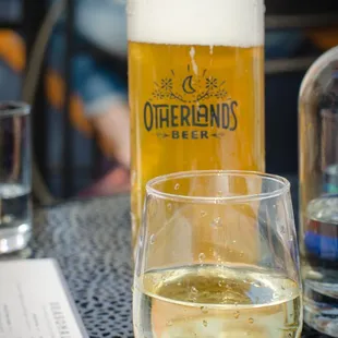 a glass of beer on a table