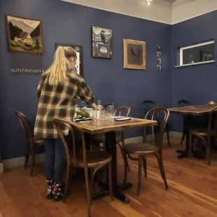 a woman sitting at a table