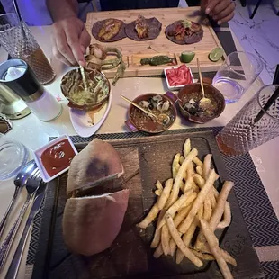 Pork belly blue corn tacos and Torta De Chilorio and fresh made salsa.