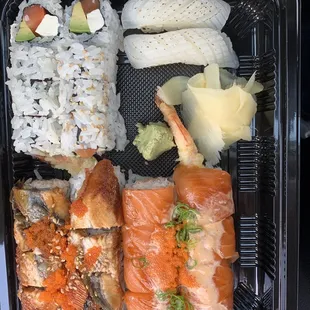 Philadelphia Roll, Ika Nigiri, Dragon Roll, &amp; King Salmon Roll