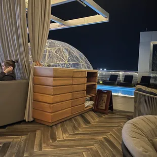 two people lounging in a lounge area