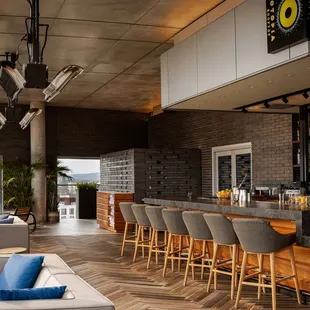 a bar with a view of the city