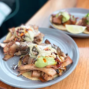Hen of the Woods Huarache - crushed avocado, pobalano crema, queso contijo, salsa