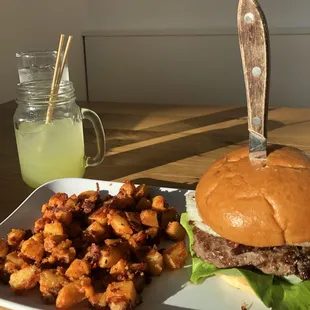 Brunch burger with home fries and agua fresca