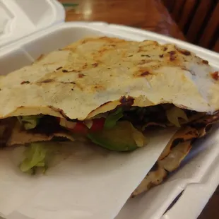 Tlayudas...huge...this is two layers packed with goodness!