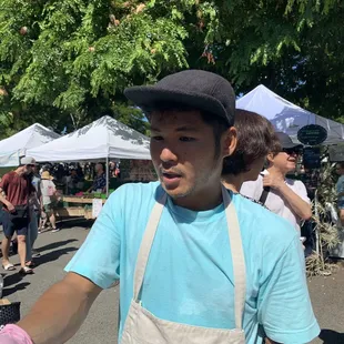 a man holding a hot dog