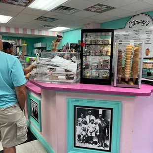 a man standing in front of the counter
