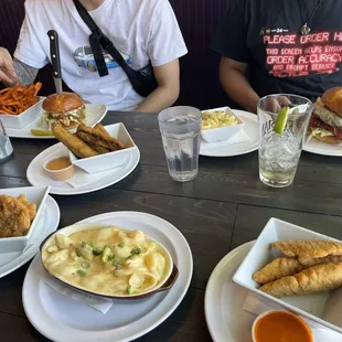 Mac N Cheese, Chicken Tenders, Fried Pickles, DIY Burger, &amp; Salmon Chimichurri burger with a side of sweet potatos!