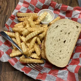 Fish sandwich, rye bread &amp; French fries