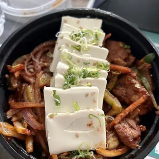 tofu and vegetables in a skillet
