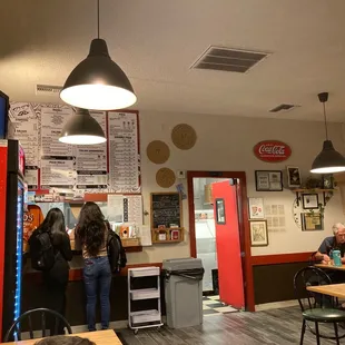 a group of people in a restaurant