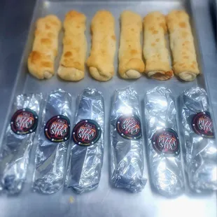 Pizza Stix out of the oven, wrapped ready for delivery!