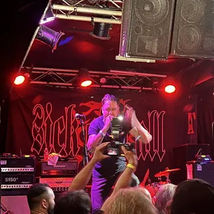 a band performing on stage at a concert