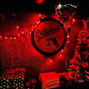 a christmas tree with red lights and decorations